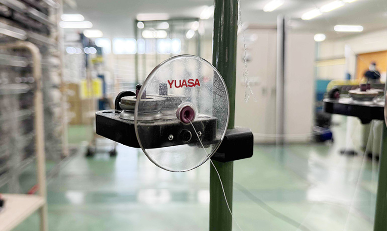 クリールに取り付けられたワッシャーテンサー